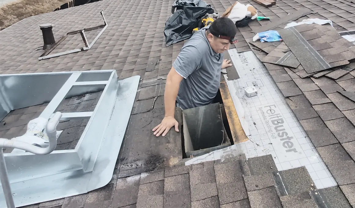 Push electrical cable through new hole in roof