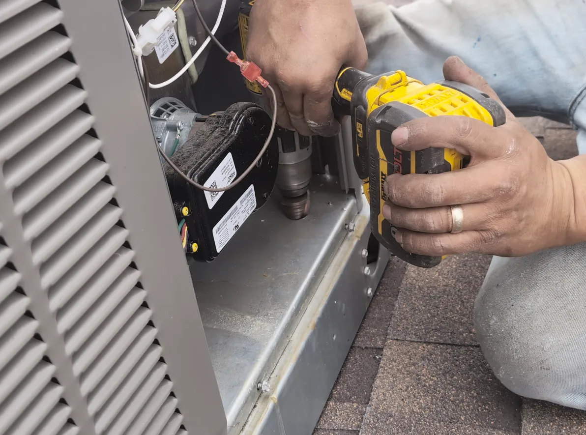 Drill hole in HVAC unit for wires